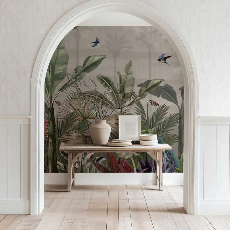 Decorative tropical wall mural plants and birds in a room with a wooden table.