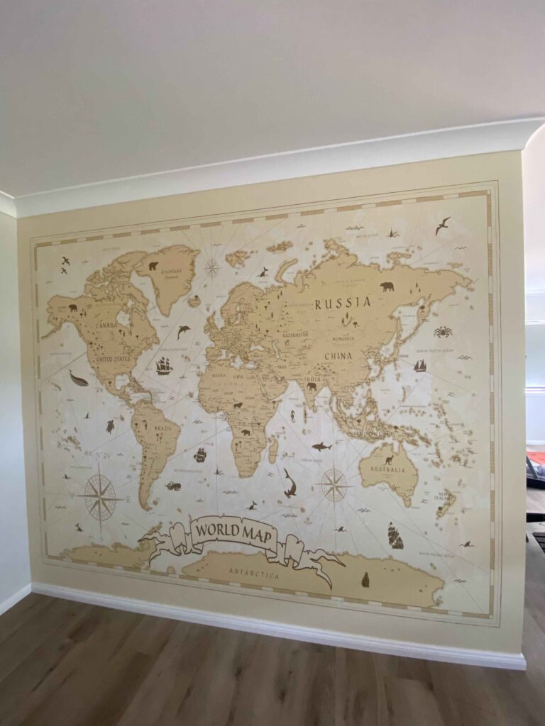 World map wall mural on a plain wall