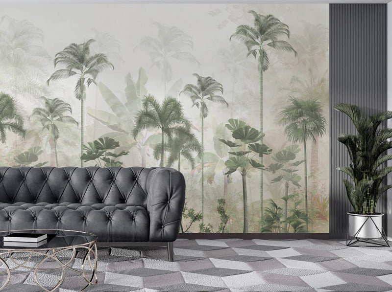 Living room with a tropical palm tree mural on the wall, gray tufted sofa, and decorative plants.