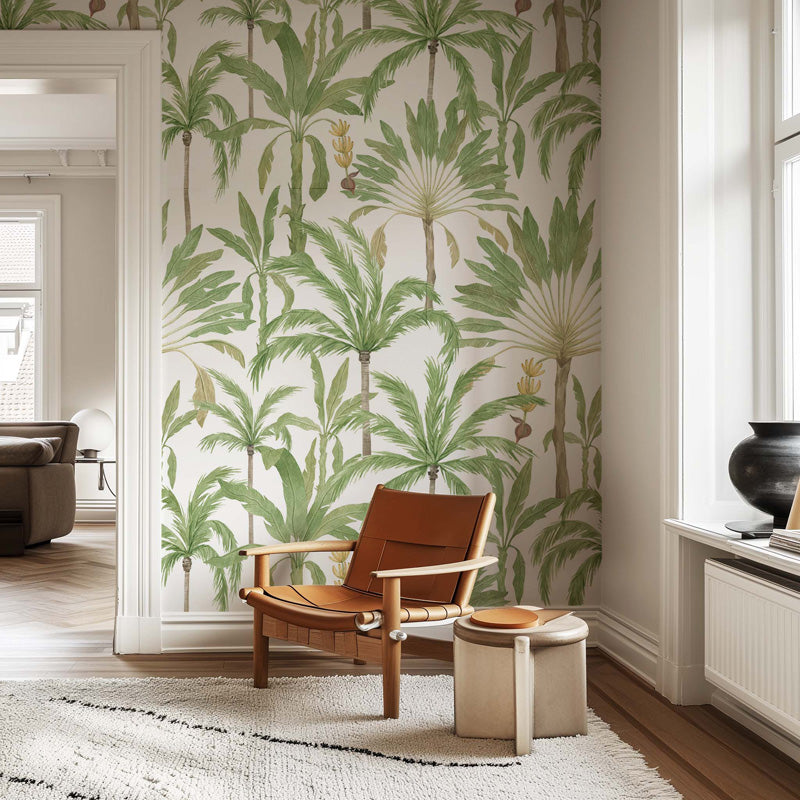Living room with palm tree wallpaper and brown leather chair