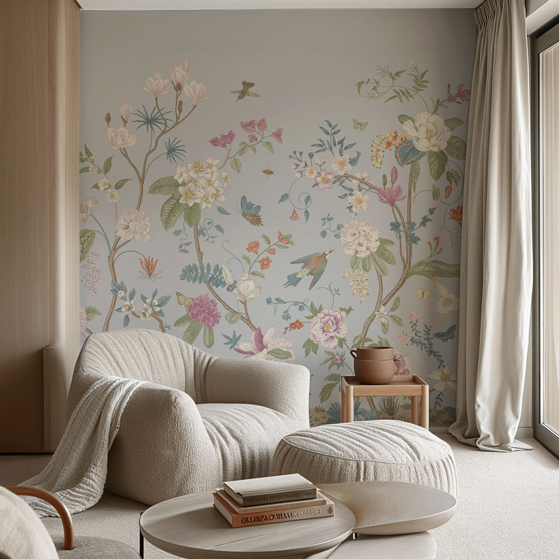 Living room with floral wallpaper, beige armchair, and small table.