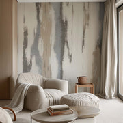 Modern living room with a textured wallpaper, armchair, and small table.