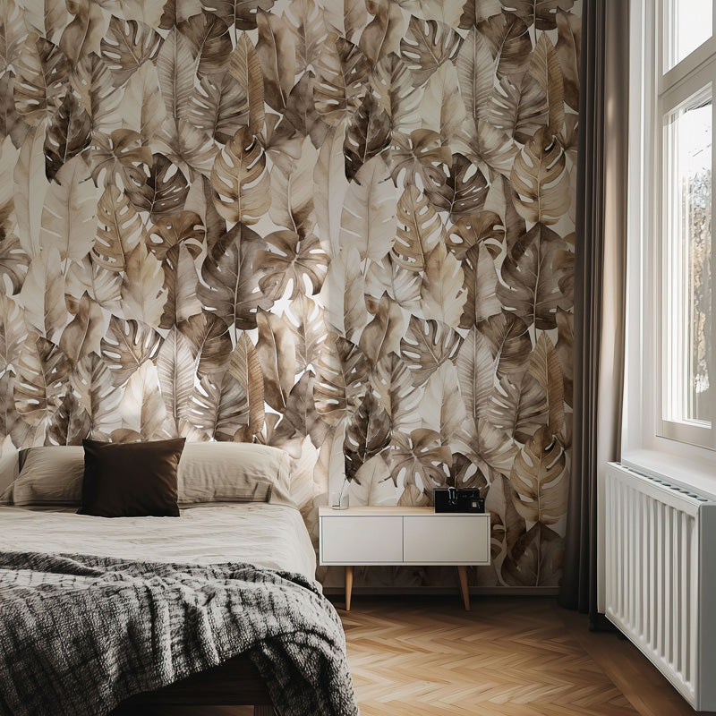 Bedroom with leaf wallpaper and a window.