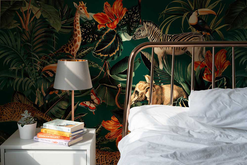 Bedroom with a tropical animal wallpaper and brass bed frame.