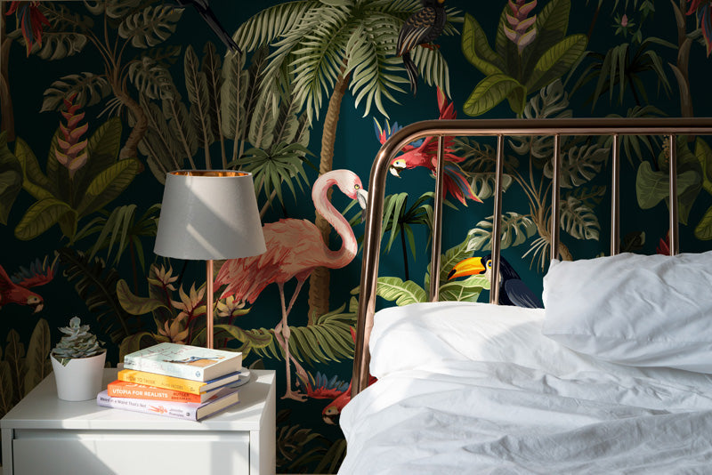 Bedroom with Botanical wallpaper, bed, nightstand, and books.