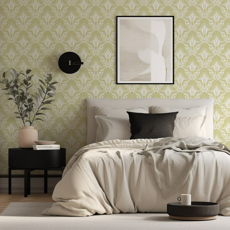 Modern bedroom with green wallpaper, bed with white bedding, and decorative elements.