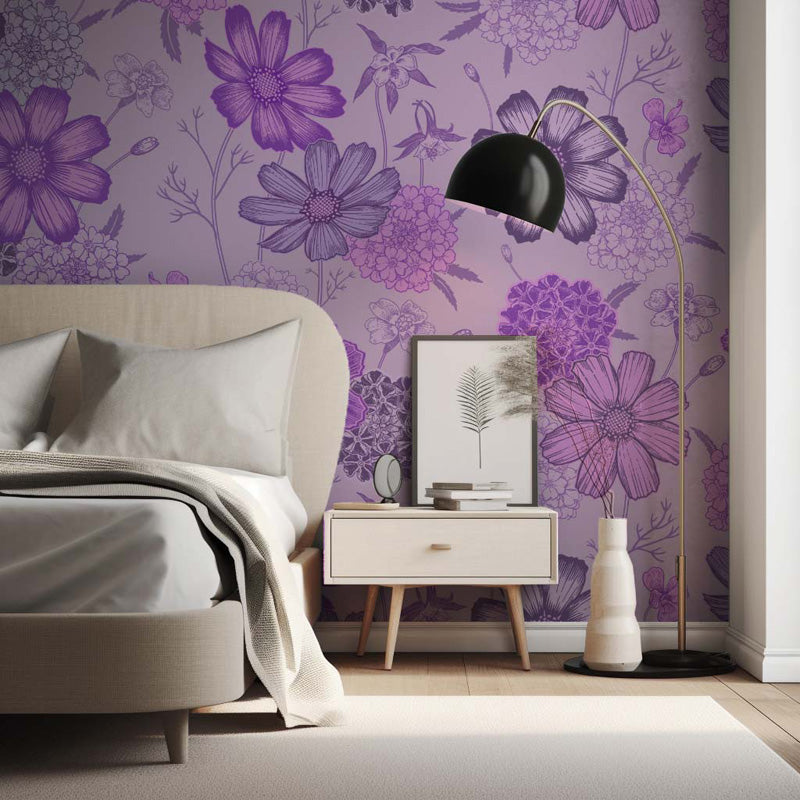 Modern bedroom with purple floral wallpaper, bed, nightstand, and lamp.