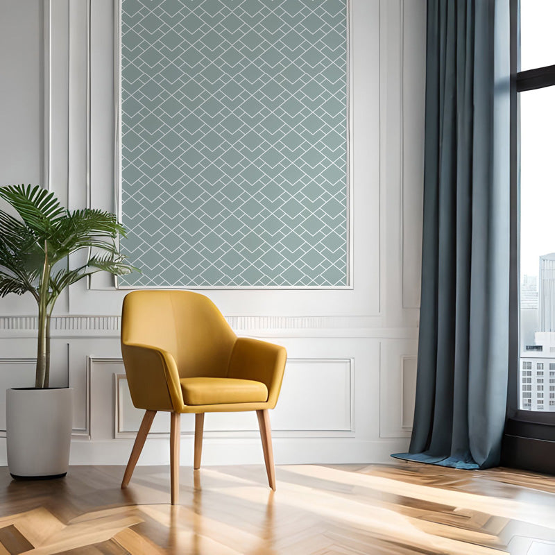 Yellow armchair in a room with a plant and large window