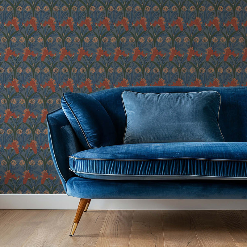 Blue velvet sofa against a willian morris walpaper