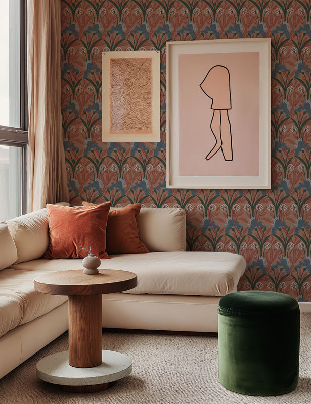 Living room with beige sofa, wooden table, and green ottoman against a red wallpaper.