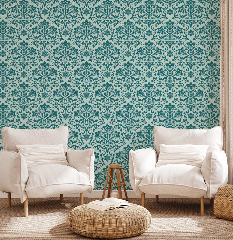 Living room with white armchairs and a blue wallpaper.