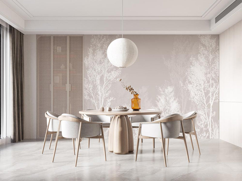 Modern dining room with a round table and chairs, featuring a neutral color forest wallpaper.
