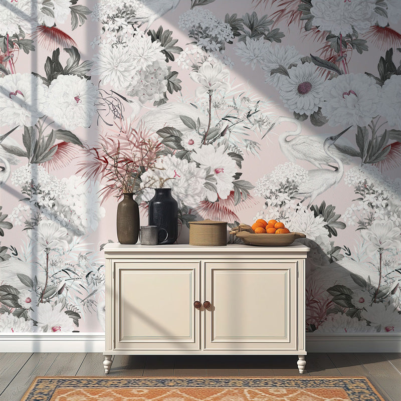 Cabinet with decorative items against a floral pink wallpaper
