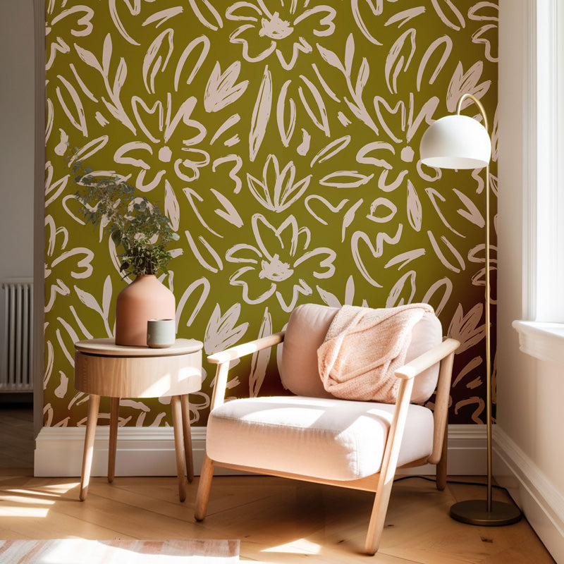 Modern living room with a floral wallpaper, armchair, and side table.