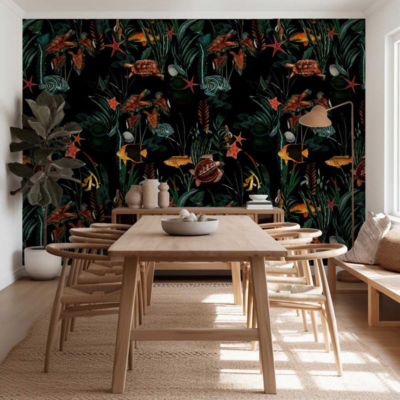 Dining room with a wooden table and chairs against a vibrant tropical wall mural.