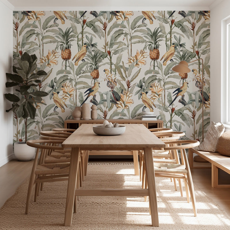 Dining room with wooden table and chairs, decorative wallpaper with plants and birds, and a bench.