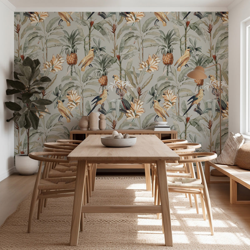Dining room with wooden table and chairs against a tropical australian wallpaper.