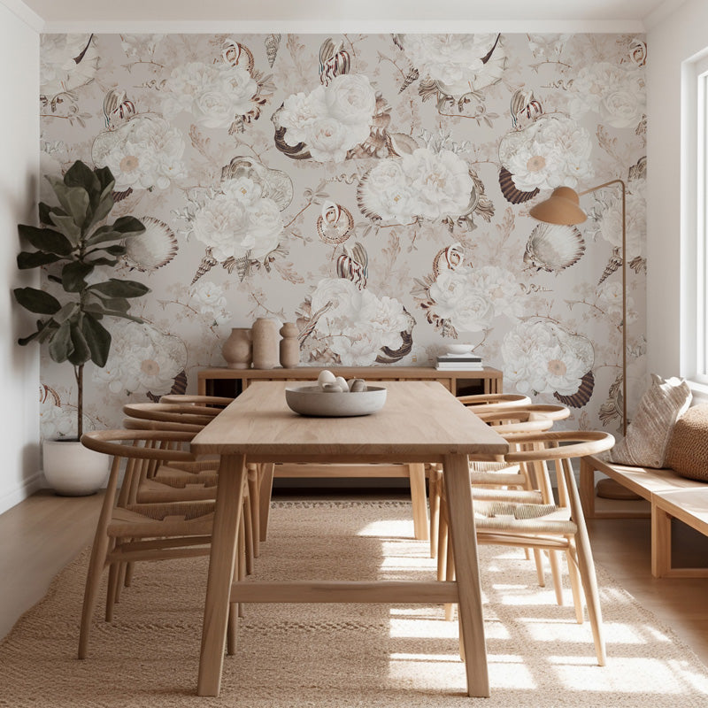Dining room with wooden table and chairs against a decorative floral wallpaper.