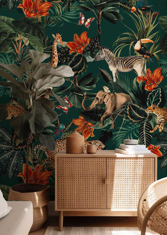 Room interior with a jungle wallpaper featuring animals and plants, a wooden cabinet, and decorative items.
