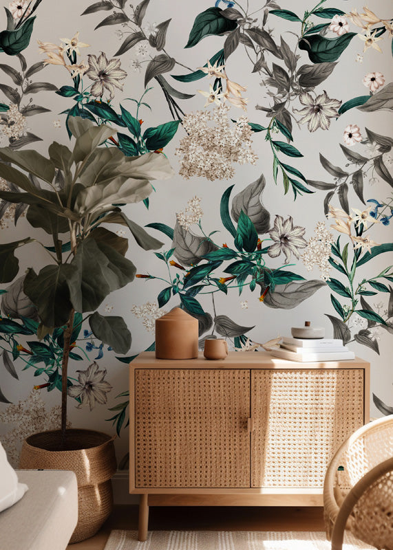 Floral wallpaper with a wooden cabinet and decorative items in a room setting.