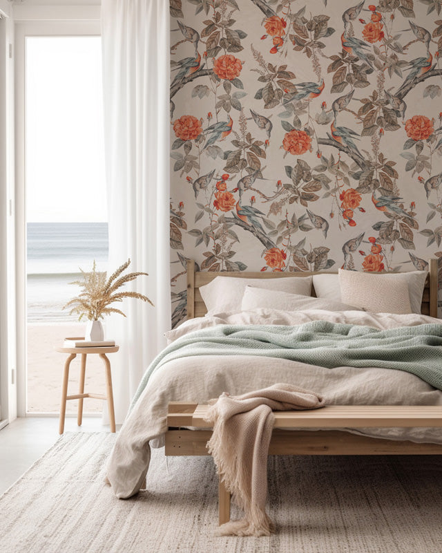Bedroom with floral wallpaper, bed, and side table.