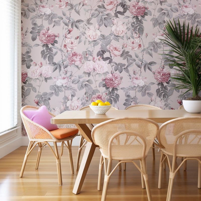 Dining room with gray floral wallpaper, wooden table, and wicker chairs.
