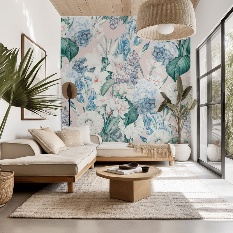 Modern living room with floral wallpaper, beige sectional sofa, and wooden coffee table.