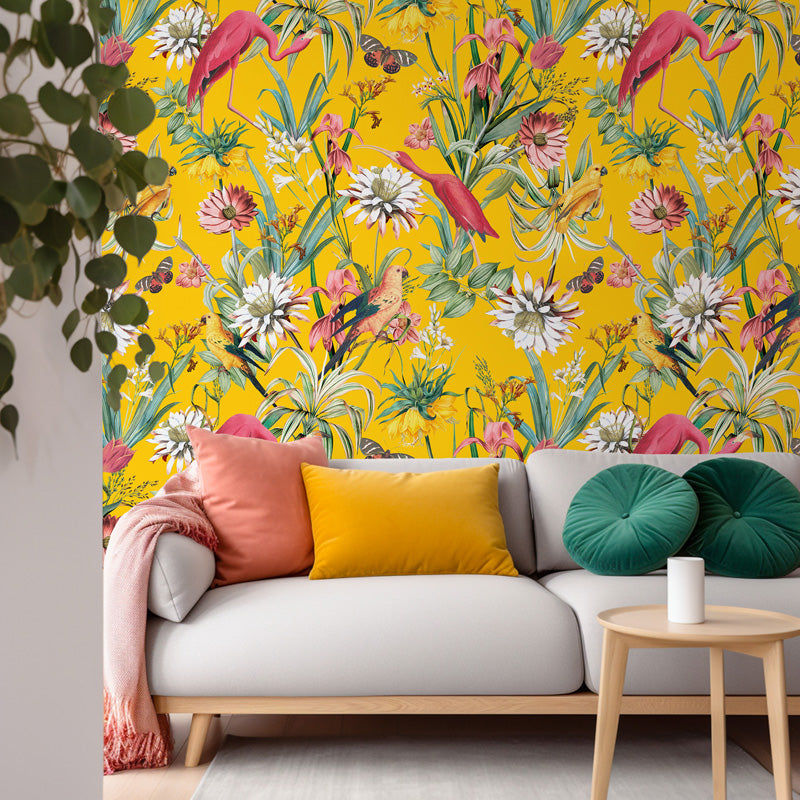 Living room with a sofa against a vibrant floral wallpaper