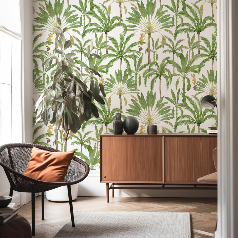 Modern interior with a wooden cabinet, chair, and decorative items against a tropical leaf wallpaper.