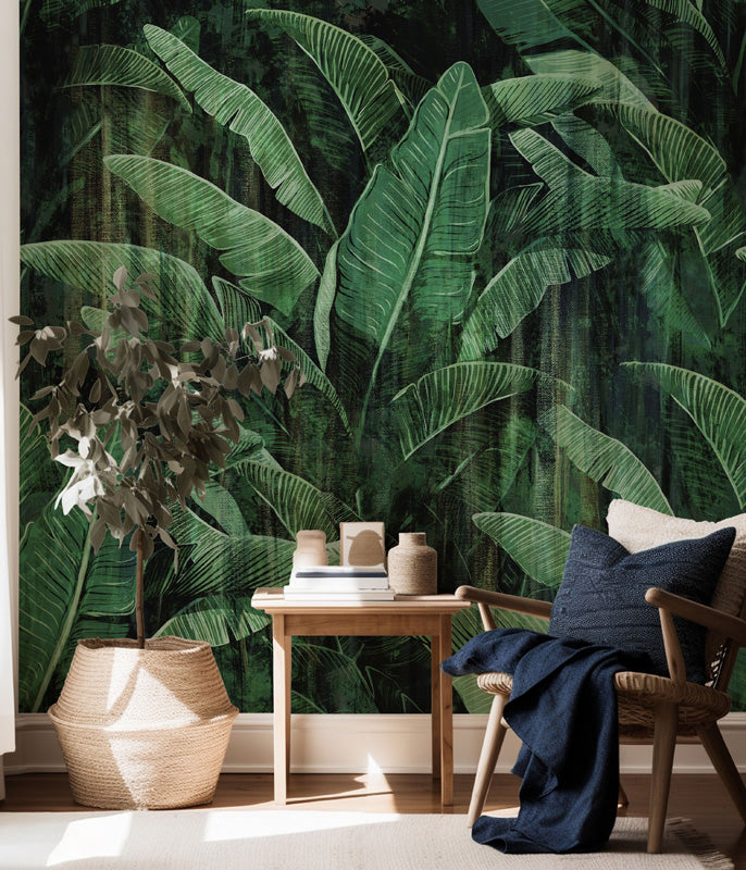 Living room with tropical leaf wallpaper, wooden table, and armchair.