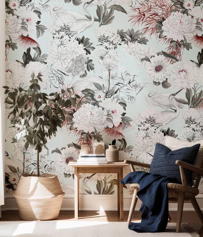 Living room with floral wallpaper, wooden chair, and decorative items.