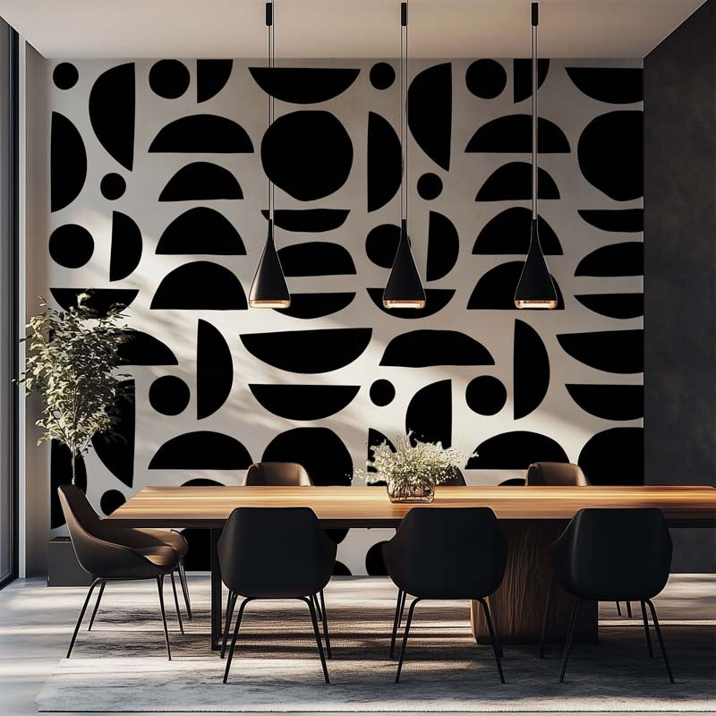 Modern dining room with a geometric patterned wallpaper, wooden table, and black chairs.