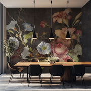 Dining room with floral wallpaper, wooden table, and black chairs.