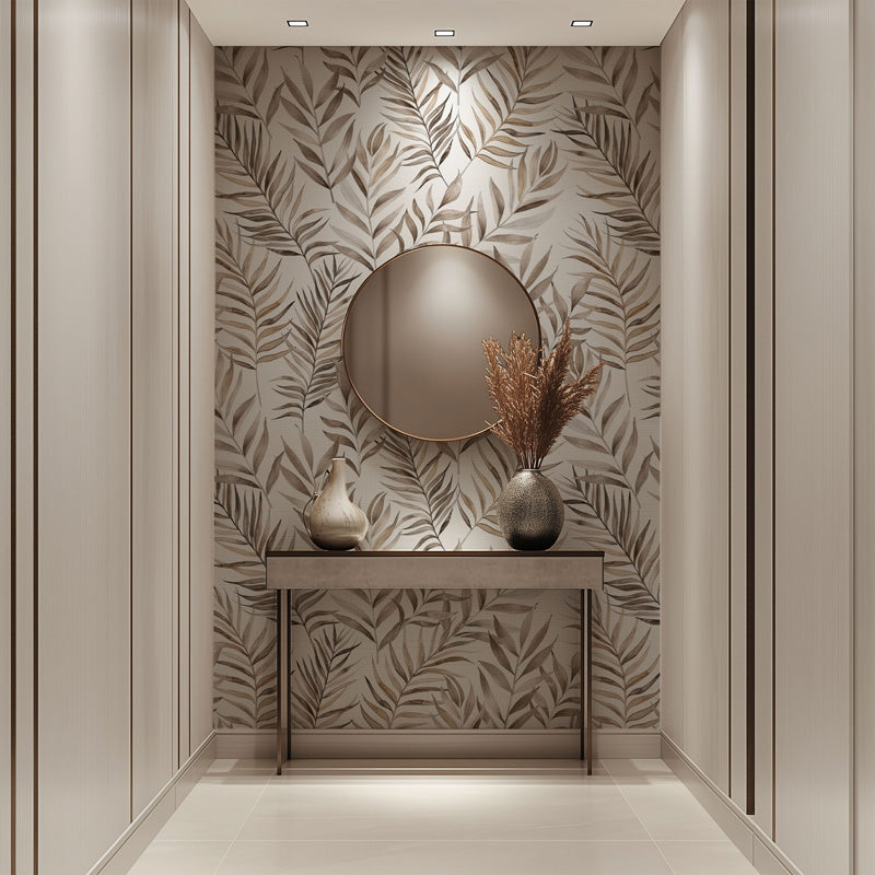 Modern interior design with a round mirror, console table, and decorative vases against a leaf wallpaper.