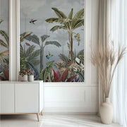 Decorative tropical wall mural with plants and birds in a modern room.