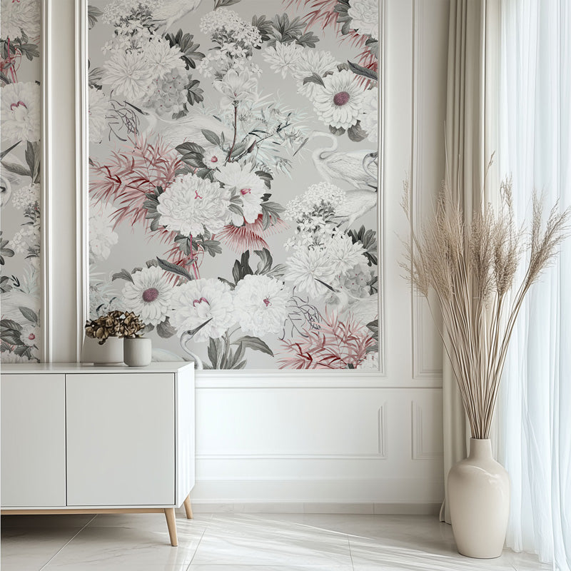Floral wallpaper with pink and white flowers in a room with a vase and decorative items.