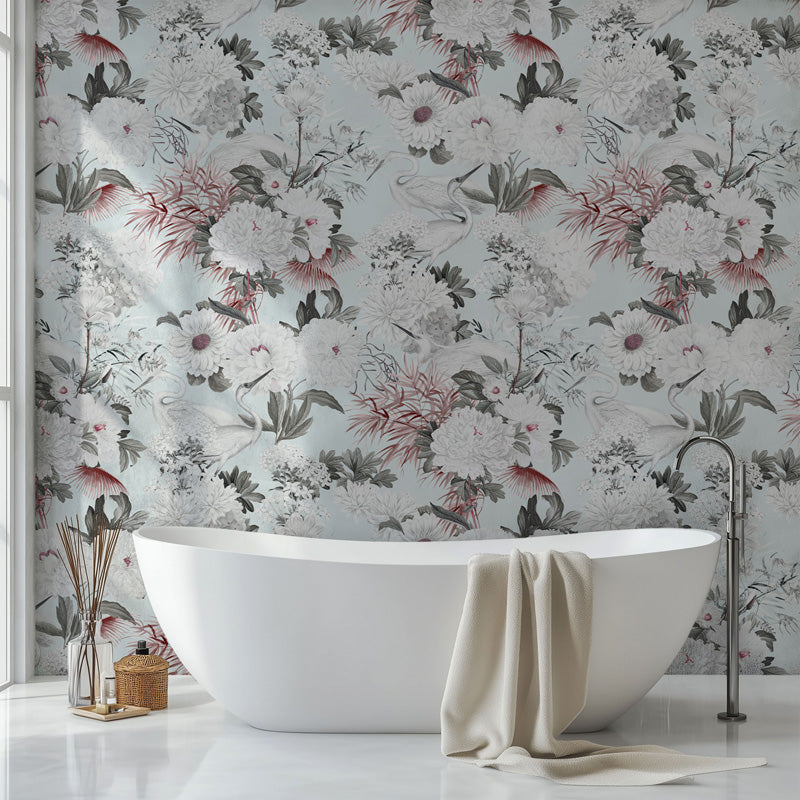Bathroom with a freestanding bathtub against floral wallpaper