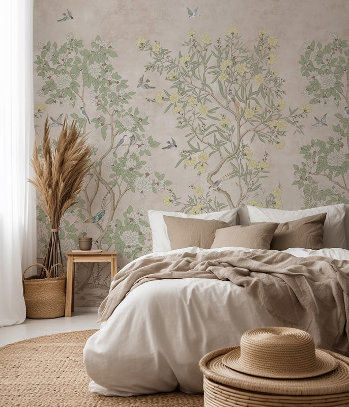 Bedroom with chinoiserie wallpaper, bed with beige bedding, and decorative elements.