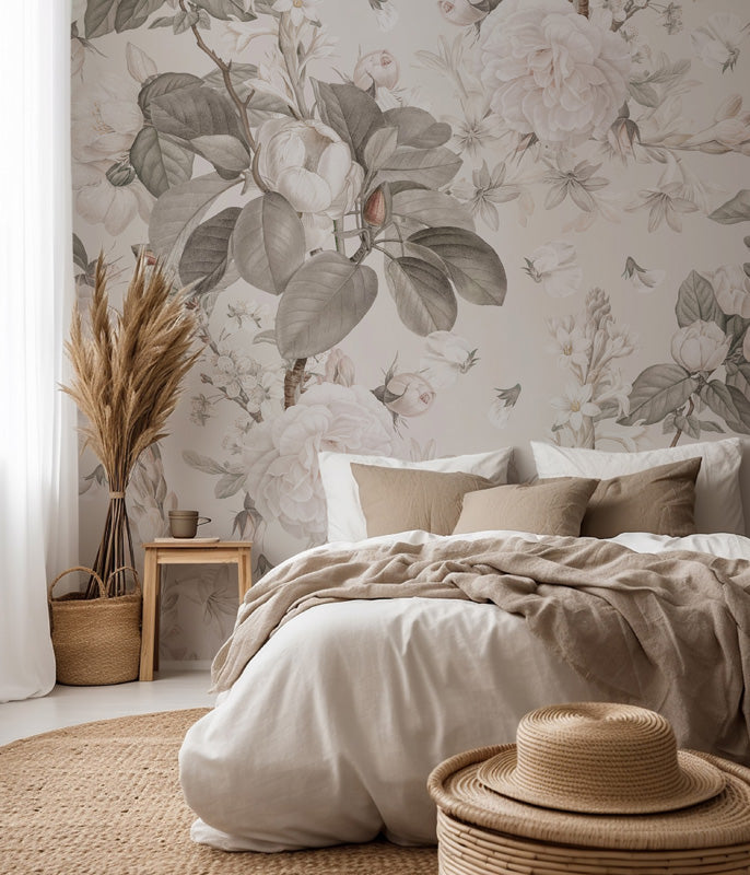 Cozy bedroom with floral wallpaper, bed, and decorative items.